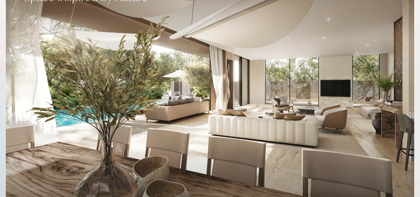 Open-plan living room with full-height glass to the garden at Alaya