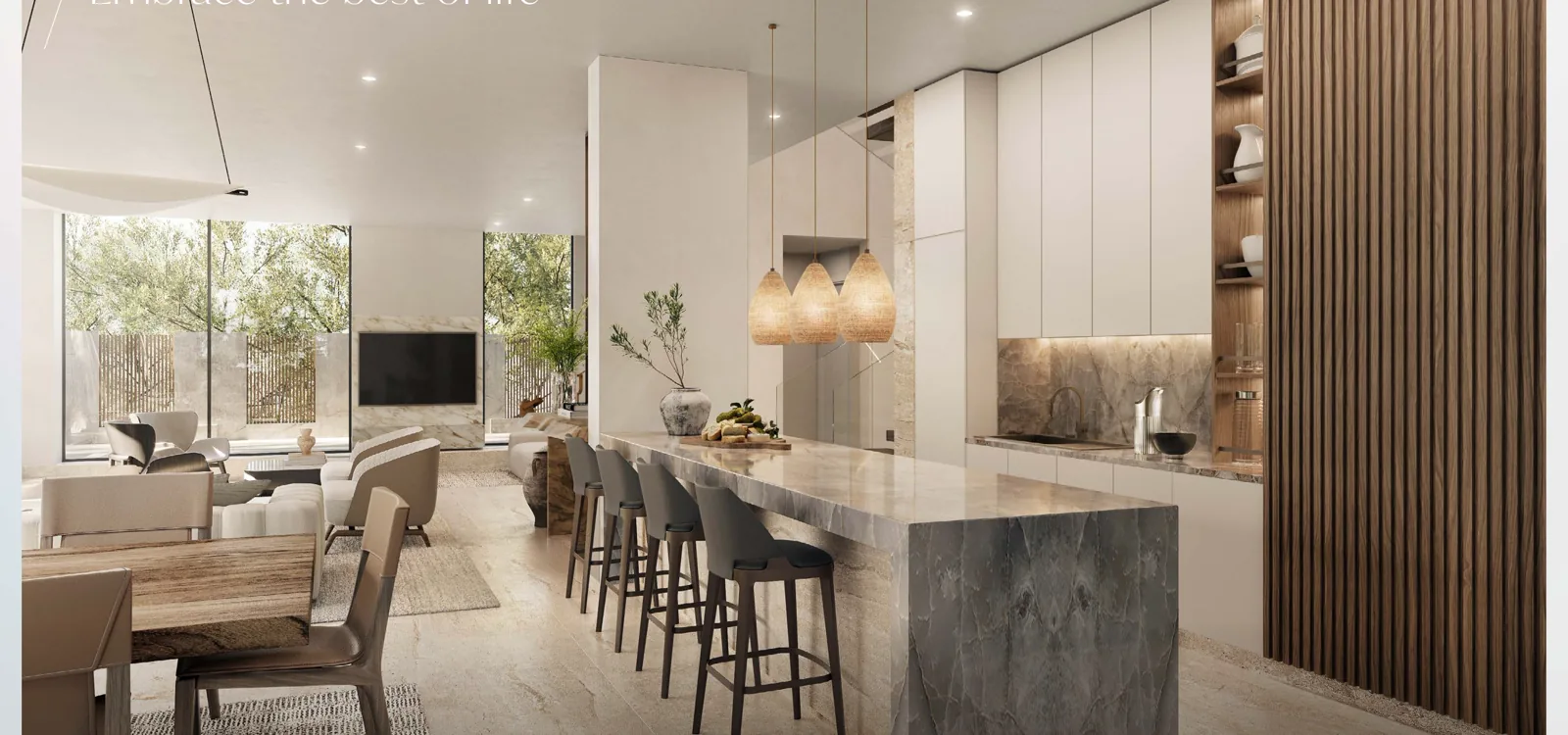 European open kitchen with a marble island and dining at Alaya