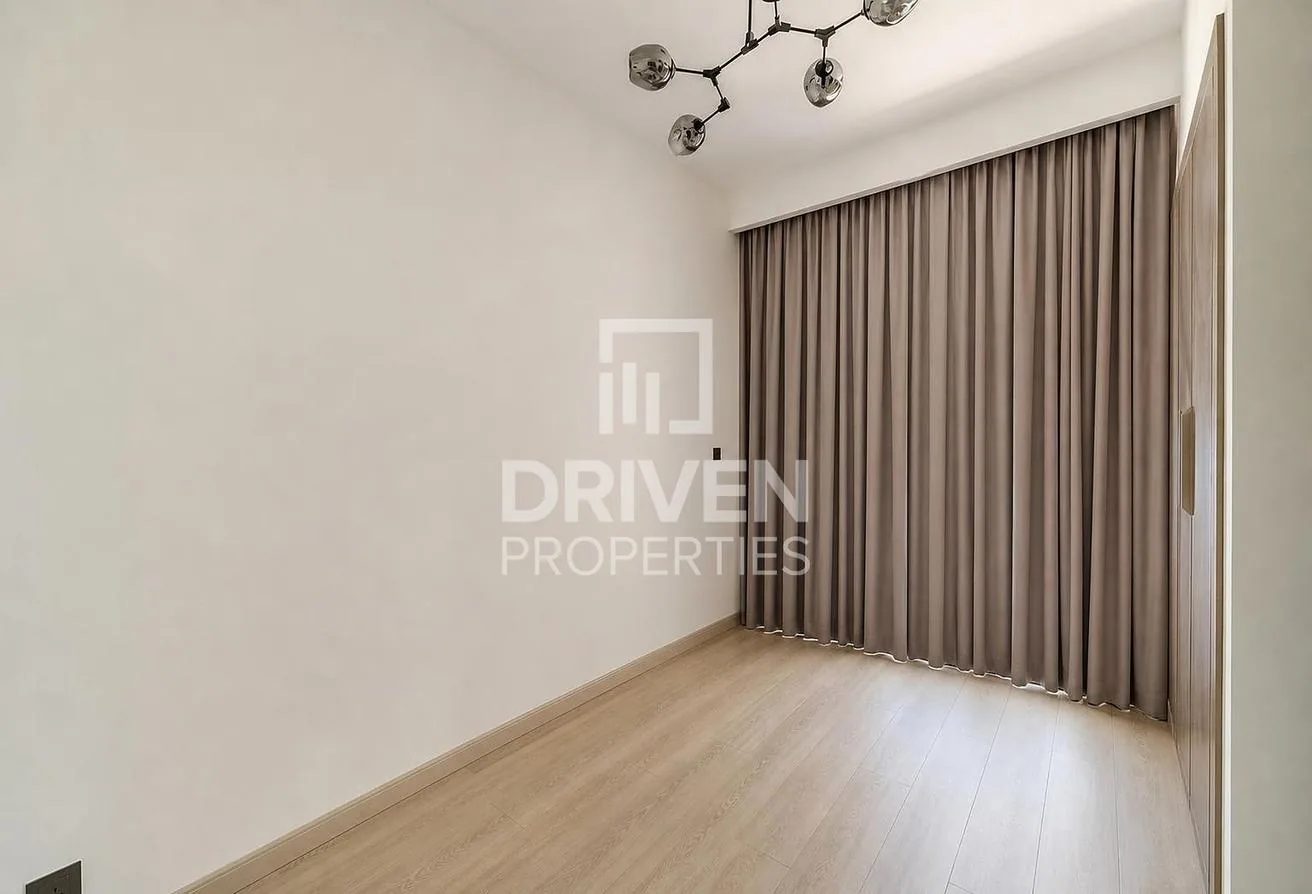 Full-height glazing and curtains onto the private studio balcony