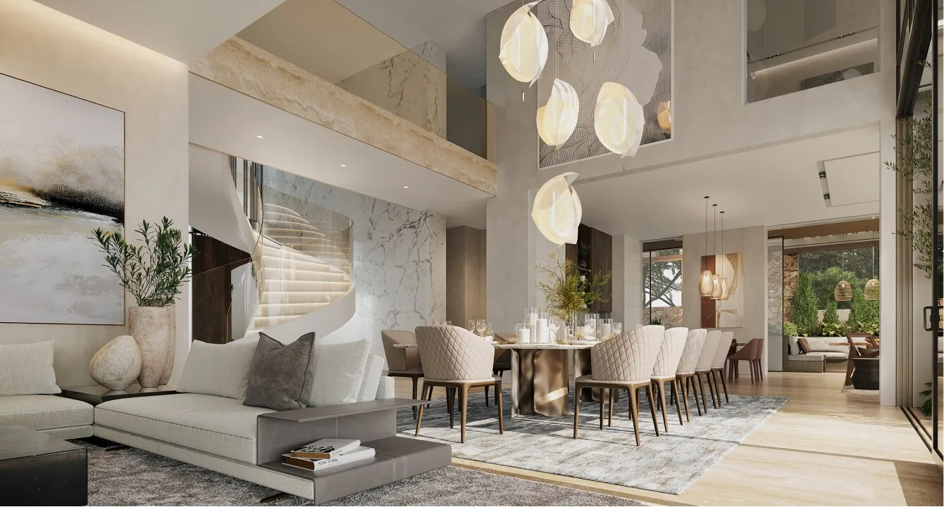 Formal dining room at Alaya Beach under a sculptural spiral staircase and a double height void