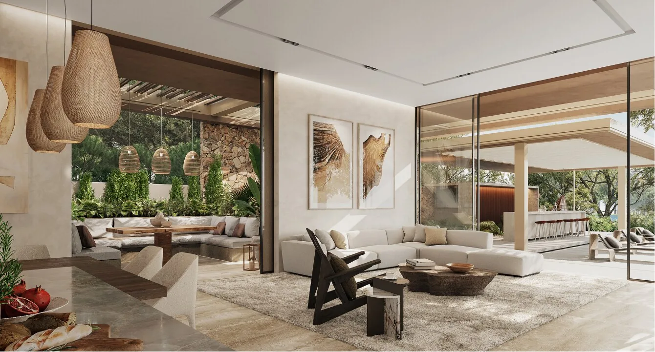 Family room at Alaya Beach opening to a shaded outdoor majlis and the pool bar