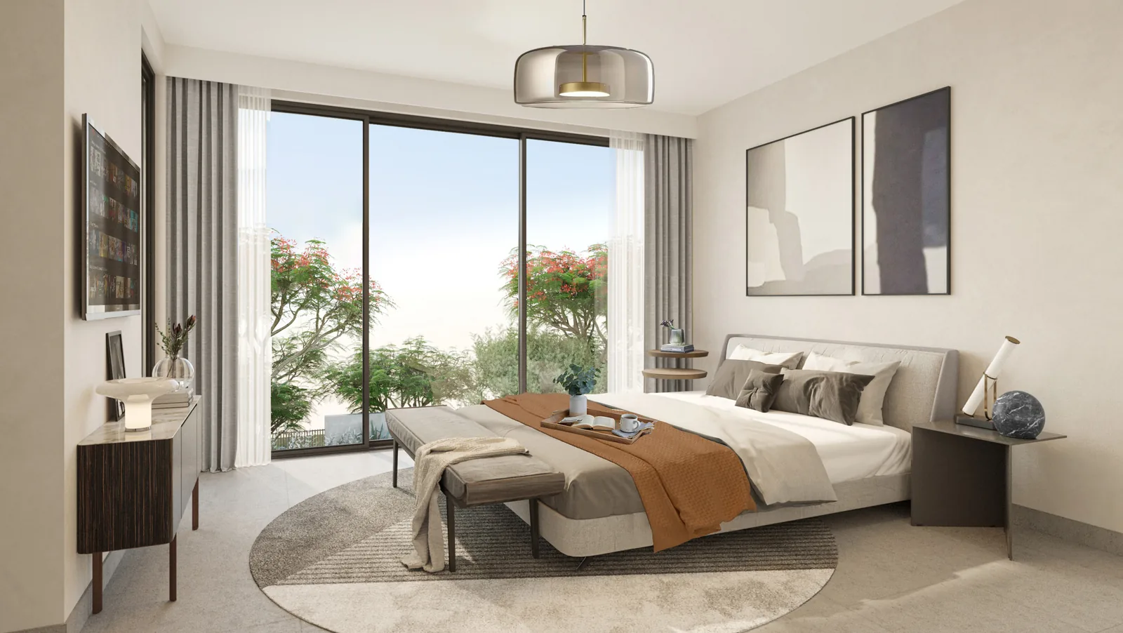 Master bedroom in an Aura twin villa with floor to ceiling glass and a view over the garden