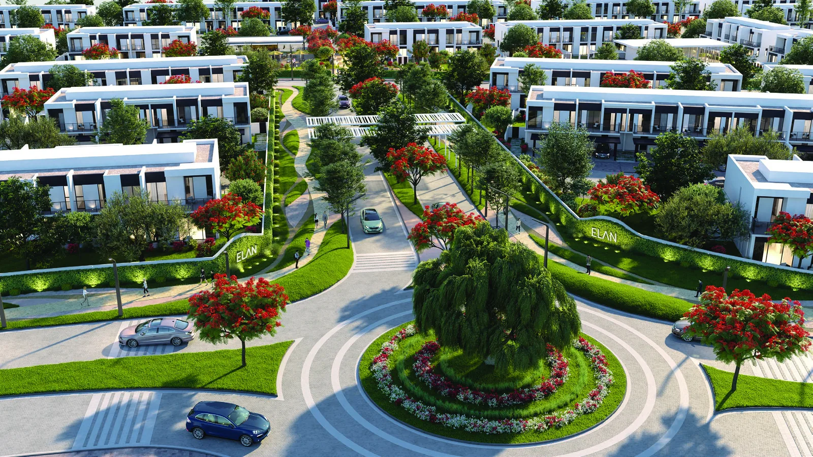 Aerial view of the Elan townhouse streets at Tilal Al Ghaf with flowering trees