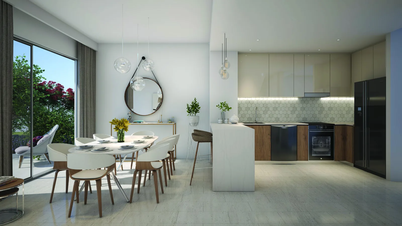 Kitchen and dining area in an Elan townhouse at Tilal Al Ghaf