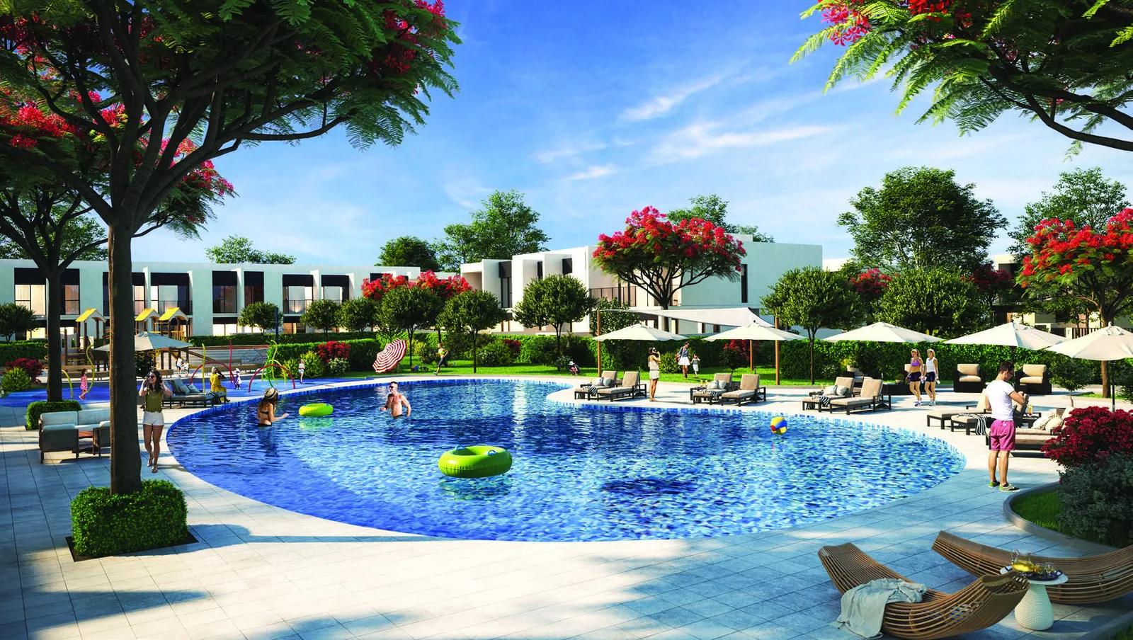 Community swimming pool with sun loungers in the Elan neighbourhood