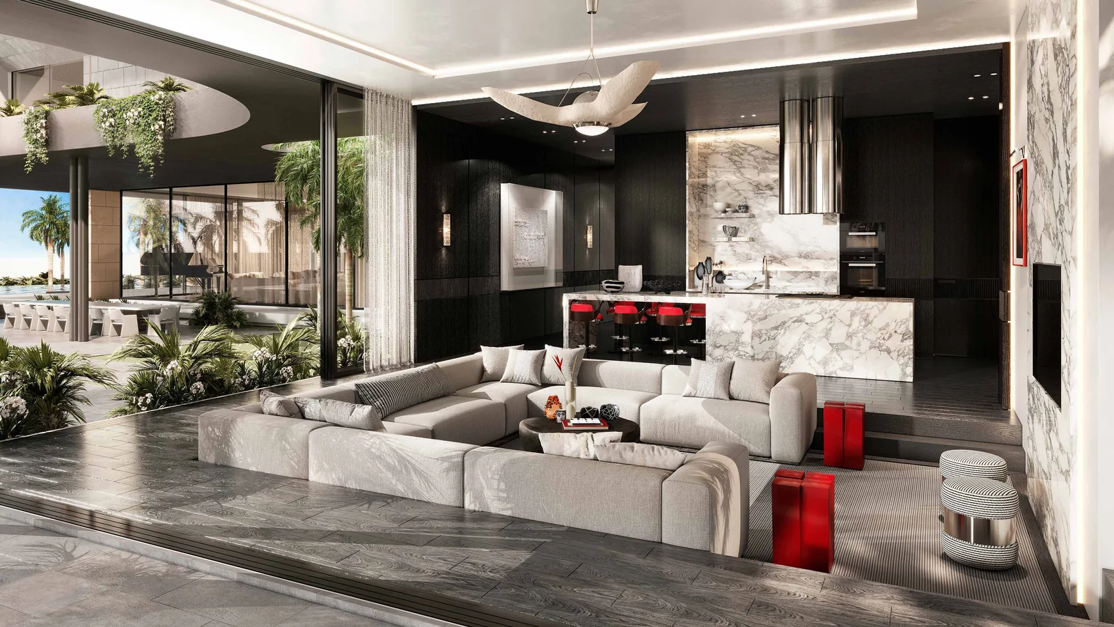 Great room with show kitchen and marble island inside an Edge estate at Lanai Islands