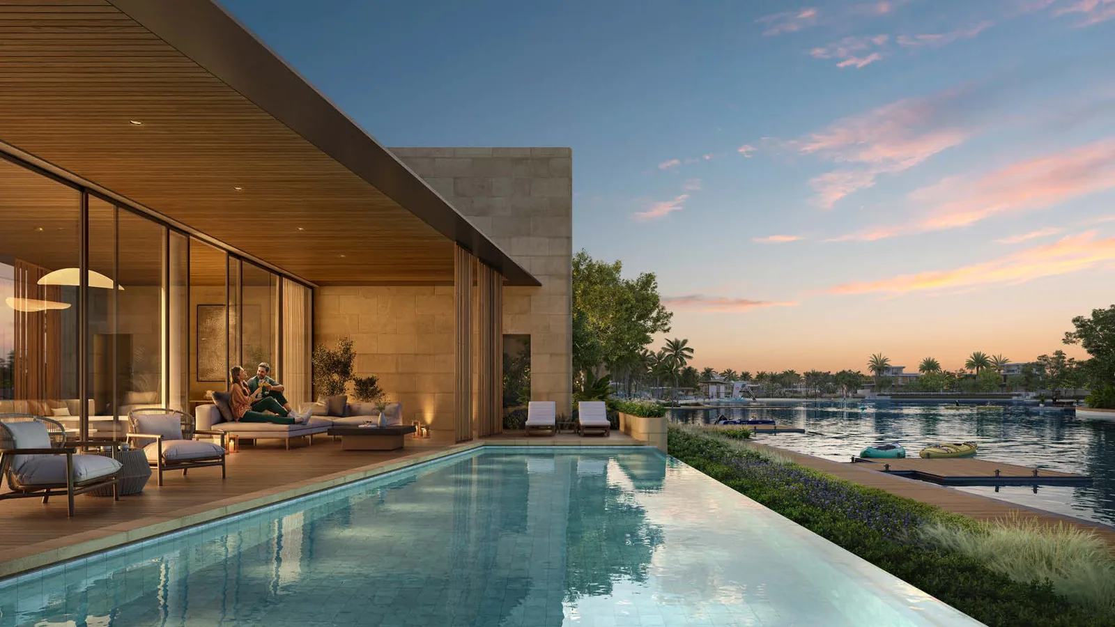 Private pool and patio at a Plagette 32 water bungalow beside the lagoon at sunset